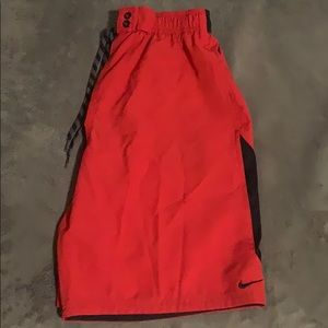 Red Nike swimming trunks